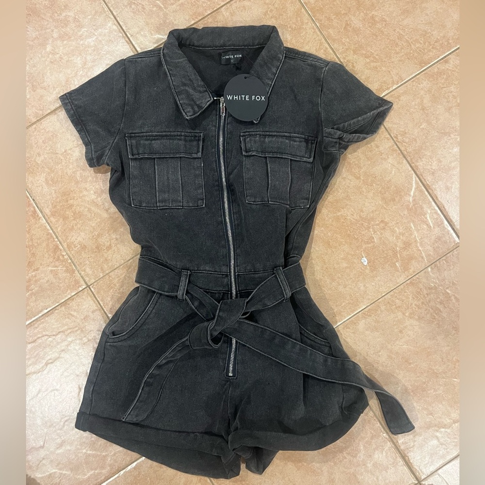 A black denim jumpsuit, never worn